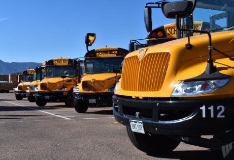 Buses at Pine Creek High School lined up waiting to pick up students.