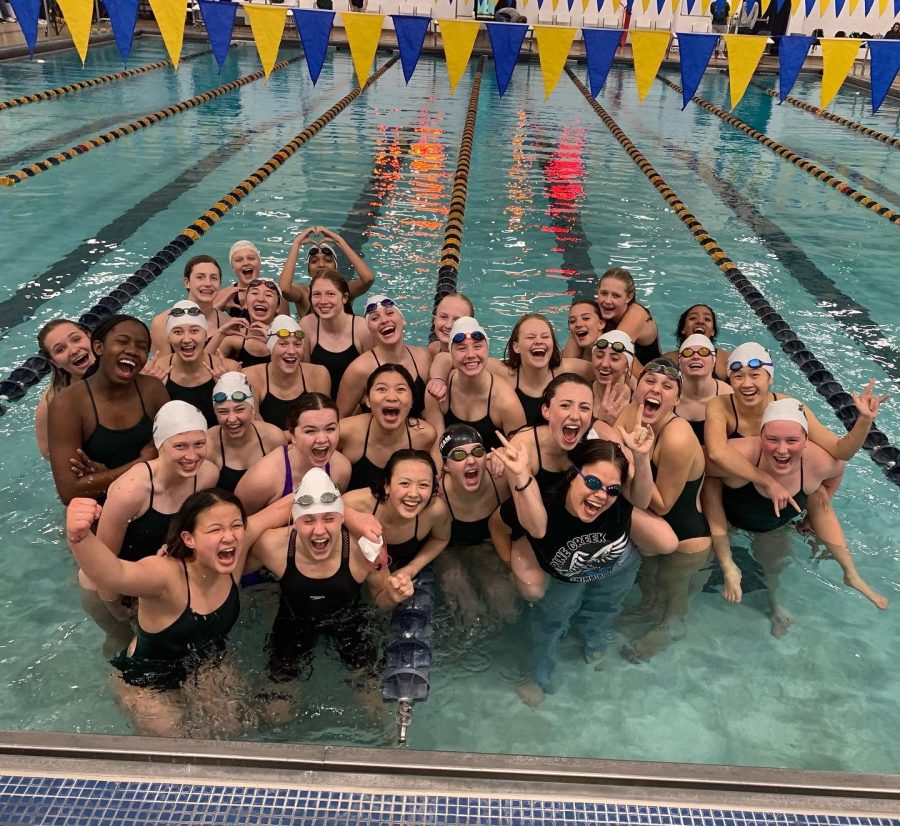 The+21-22+State+Runner-up+Girls+Swim+and+Dive+team+celebrates+their+win.+