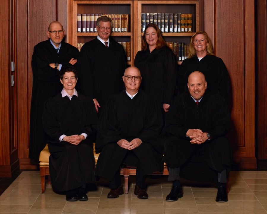 Top from left: Justice Carlos A. Samour, Jr., Justice Richard L. Gabriel, Justice Melissa Hart, Justice Maria E. Berkenkotter Bottom from left: Justice Monica M. Márquez, Chief Justice Brian D. Boatright, Justice William W. Hood, III