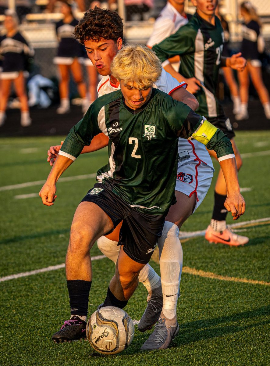 Lucas Colodny (12) handles the ball against Legend on September 5. 