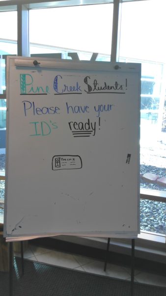 Students must show their ID upon entering the school. This sign is at the entrance of the school to remind them. 