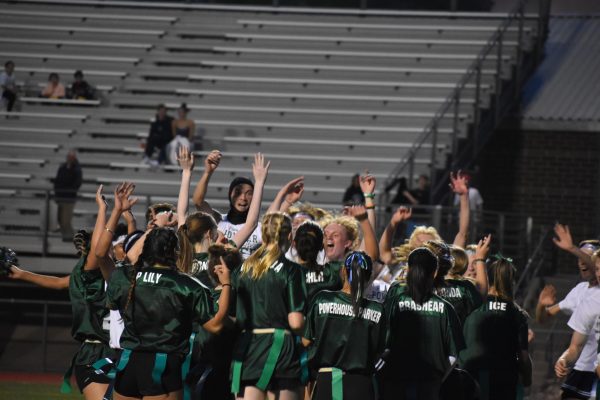 The senior team celebrates after a win
